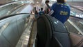 Bangkok, Thailand - March 29, 2018 : Passenger with baggages walking from airport to subway station at Suvarnabhumi