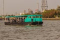 Bangkok, Thailand - March 14, 2017: People are crossing Chao Phraya river from Wat Bang Nam Pheung Nok via ferry service to Wat B Royalty Free Stock Photo