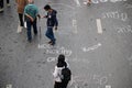 Pro-democracy protesters graffiti on the road by chalk in protests