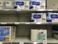 Bangkok Thailand-March 26,2020:shelves toilet paper products some brands are sold out,amid corona virus fears, shoppers panic