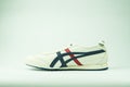Bangkok, Thailand - March 4, 2023 : The shoes made by Onitsuka Tiger Model Onitsuka Tiger MEXICO 66 SD on a white background