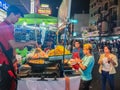 Bangkok, Thailand - March 2, 2017: Street food vendor cooking a Royalty Free Stock Photo