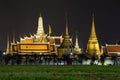 Bangkok Thailand , March 10 , 2021 : The Temple of the Emerald Buddha and The Grand Palace with beautiful lights at night is an Royalty Free Stock Photo