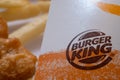 Closed up of Burger King's french fries on white background. Focus on Burger King's logo