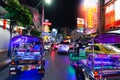 Bangkok, Thailand - March 2019: tuk-tuk taxi driver at China town night market Royalty Free Stock Photo