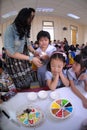 Primary school students organize birthday parties in the school canteen.