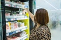 Bangkok, Thailand - May, 22, 2021 : Asian woman shopping frozen food in Tesco Lotus Department Store at Bangkok, Thailand Royalty Free Stock Photo