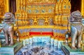 The bronze lions guard the main entrance to the Emerald Buddha Temple in Grand Palace, on May 12 in Bangkok, Thailand