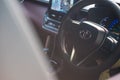 Bangkok, Thailand - MAY 14, 2022 : Close up of the steering wheel of the Toyota brand is controlling when driving in Corolla CROSS