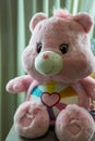 Bangkok, Thailand - May 4, 2024 : Cute a pink Care Bears. Teddy bear dolls Care Bears