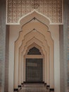 Diminishing perspective interior view of inner Bang O mosque hallway leading into blue wall