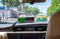 BANGKOK, THAILAND - MAY 02: GPS tracked digital taxi fare meter ticks in an unidentified Taxi in Bangkok on May 02, 2019