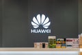 Bangkok, Thailand - May 24, 2019: Huawei company logo at retail store booth with product display and brochures