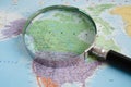 Bangkok, Thailand - May 15, 2022 Magnifying glass on world map