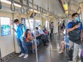 Bangkok, Thailand, 25 MAY 2020 MRT subway train.People are wearing medical face mask sitting and standing far apart of social dist