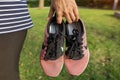 The NIKE pink shoes with red box of women for exercise at the park.