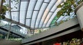 Perspective of indoor garden between shop under skylight roof at True digital park building