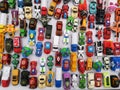 Bangkok, Thailand - MAY 24, 2019: Top view assorted metal colorful toy car on the white background at street market.