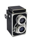 Vintage twin lens reflex photo camera. Old two lens medium format film camera, isolated on white background with clipping path Royalty Free Stock Photo