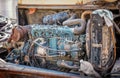 BANGKOK, THAILAND - MAY 05: Worn out and old inline six cylinder diesel engine rests on the back of an unidentified bulldozer in