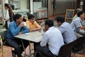 Bangkok, Thailand: Men Drinking Beverages at Sidewalk Cafe