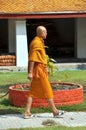 Bangkok, Thailand: Monk at Wat Mahathat Royalty Free Stock Photo