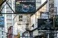 Narrow street advertising signs. Walking around the city. Famous sights of Bangkok.