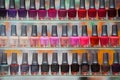 Bangkok, Thailand - 22 Nov 2017: Colorful nail polisher are arranged on the glass shelf in nail polisher shop at the department