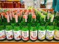 Many bottles of Soju on shelf for sale