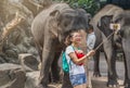 Asian tourist selfie with elephant in Safari World Zoo Royalty Free Stock Photo