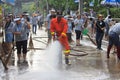 BANGKOK THAILAND - NOV21 : Unidentified people go to Phaholyothin Rd.and washing cleaning the road after end of flood in this are