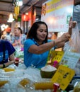 Bangkok, Thailand - November 2, 2019: Asian woman working at a street market