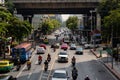 Car and bike traffic in central Bangkok (Rama I Road)