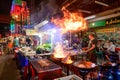 Bangkok, Thailand - November 22, 2020 : Chef cooking food at street side restaurant in Yaowarat road Royalty Free Stock Photo
