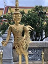 Bangkok, Thailand: Gold Kinnara statue, a mythical half-human, half-bird creature on Wat Phra Kaew in the Grand Palace