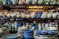 Bangkok, Thailand - November 30, 2019: Handcrafted pottery, teapots and dishes for sale at a stall in Chatuchak Weekend Market