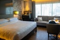 Interior King bed room hotel suite at the JW Marriott in Bangkok Thailand