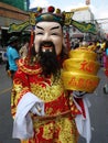 A man in costume at a Bangkok Chinese Community Clan Festival