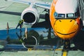 Bangkok, Thailand - November 6, 2021 : member ground crew worker checking aircraft turbine engine, air intake and fan blades of