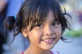 Positive portrait of a thai young girl on the streets of Bangkok, Thailand