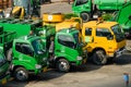 BANGKOK, THAILAND - NOVEMBER 11, 2014: Row of garbage trucks on