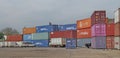 Stacked shipping containers and utility vehicles