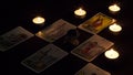 Bangkok,Thailand,november.13.19. Tarot cartomancy. Cards for divination on a black background with the reflection of the moon.