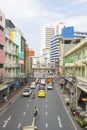 View of Wang Burapha intersection and many vehicles on the road in Bangkok, Thailand