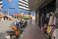 View of Wang Burapha intersection and many vehicles on the road in Bangkok, Thailand