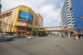 View of Wang Burapha intersection and many vehicles on the road in Bangkok, Thailand