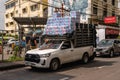 White toyota pick up loaded with toilet paper in Bangkok, Thailand