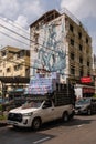 White toyota pick up loaded with toilet paper in Bangkok, Thailand