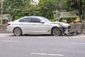 BMW 5-series damaged in accident. The wreckage of the car was abandoned by roadside Royalty Free Stock Photo
