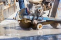 Close up cutting concrete machine are working on wet floor Royalty Free Stock Photo